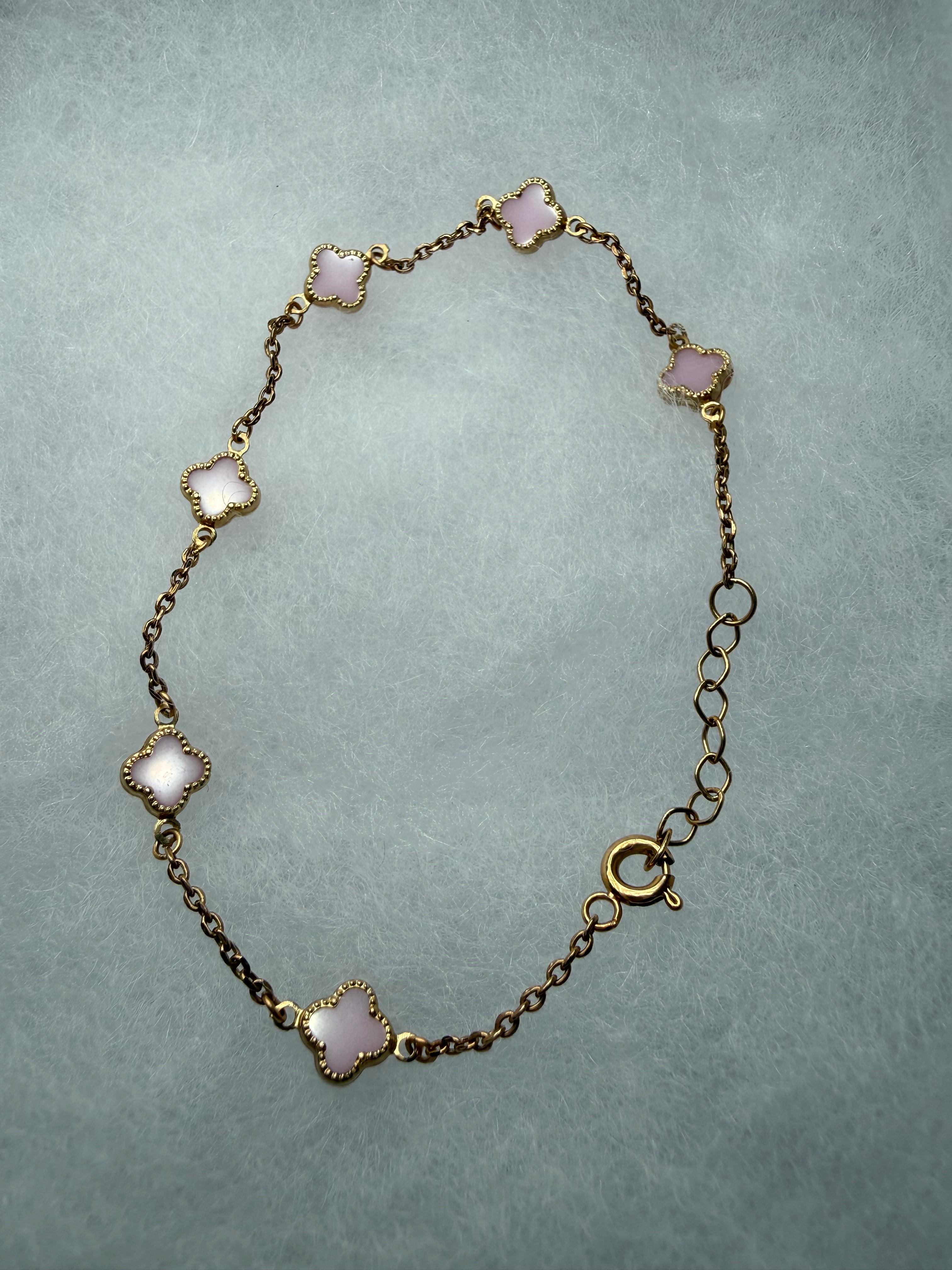 Pulsera de mujer con diseño de 6 flores en color rozado