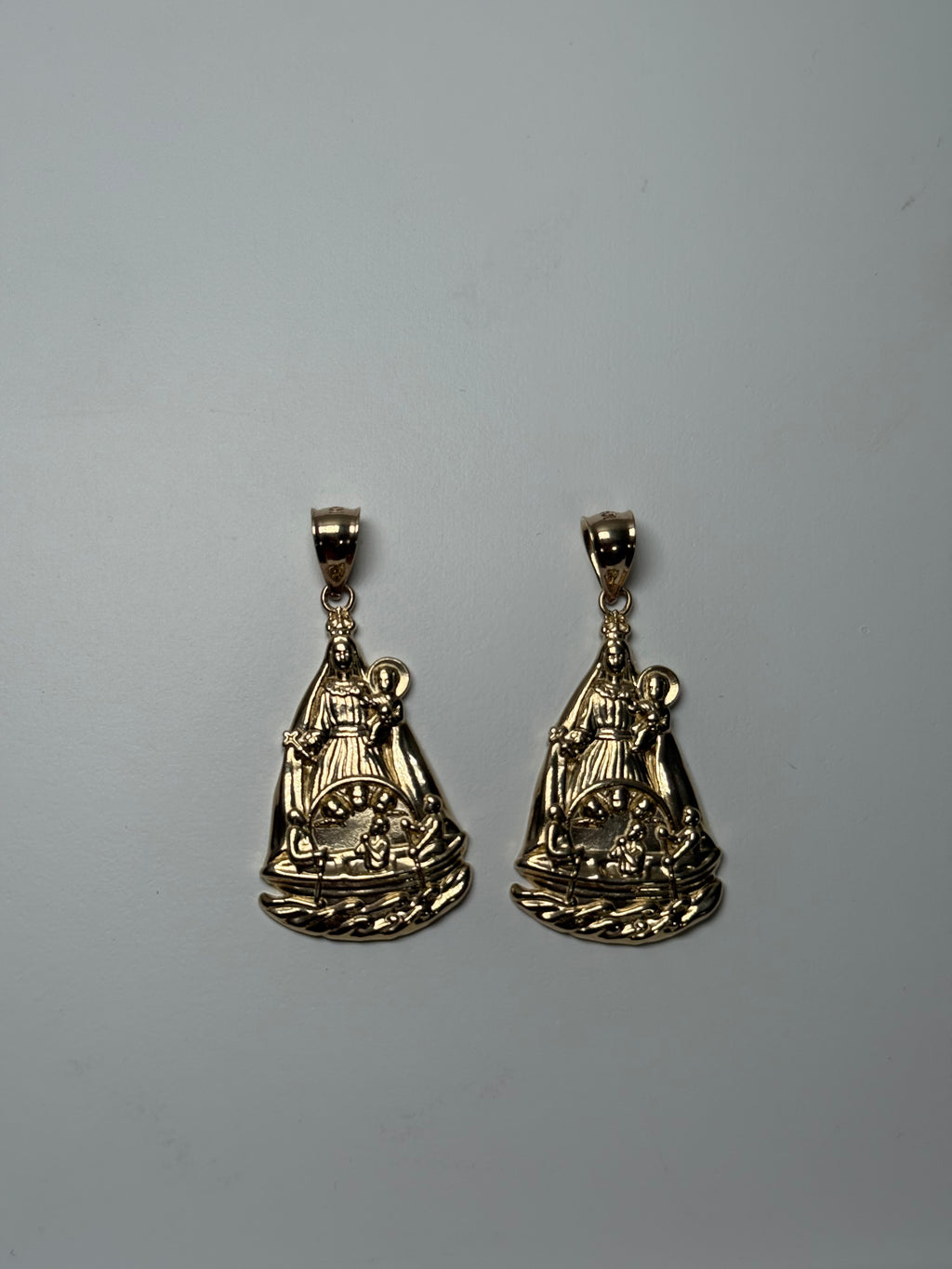 Dijes de La caridad del cobre