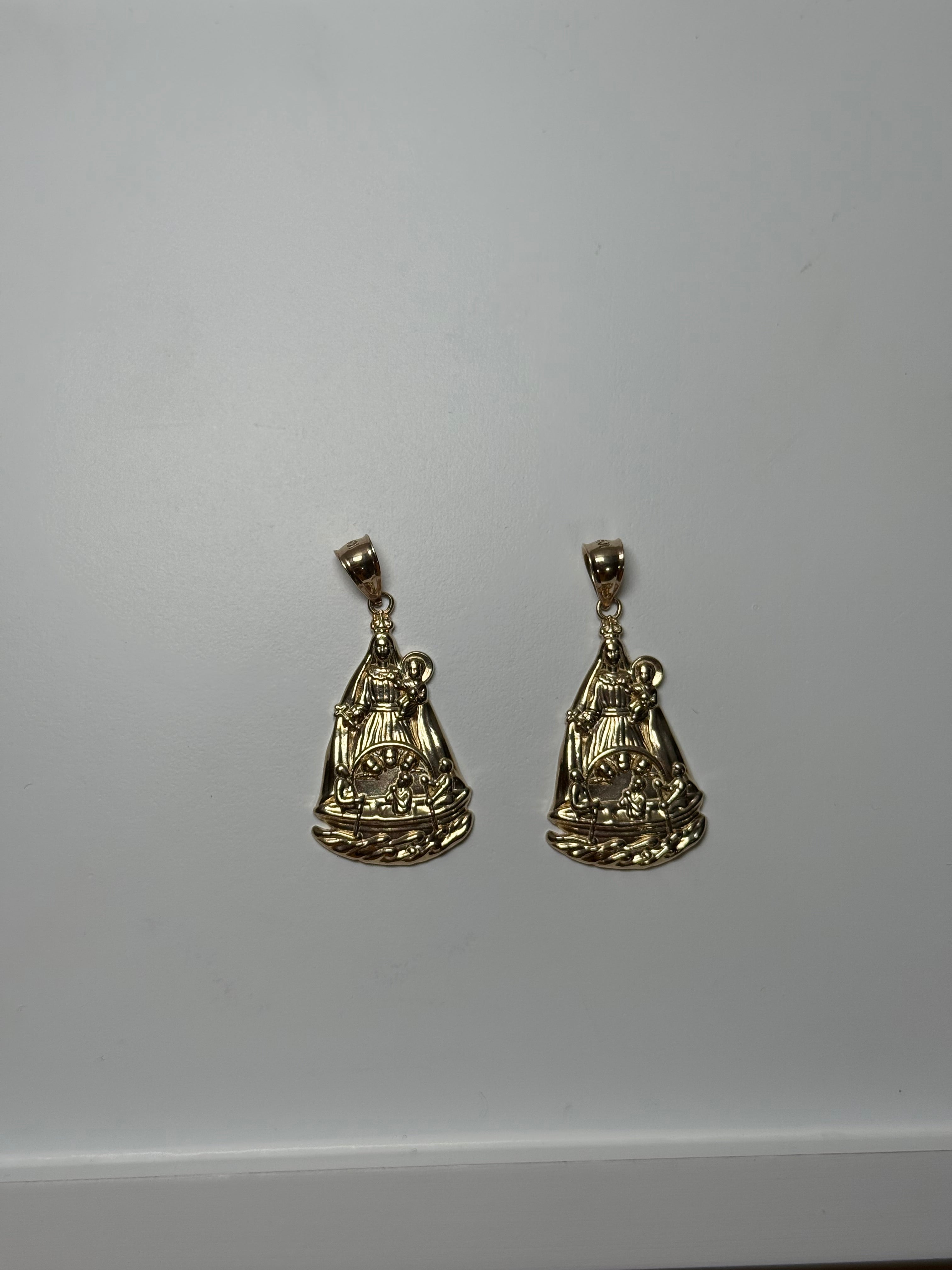 Dijes de La caridad del cobre