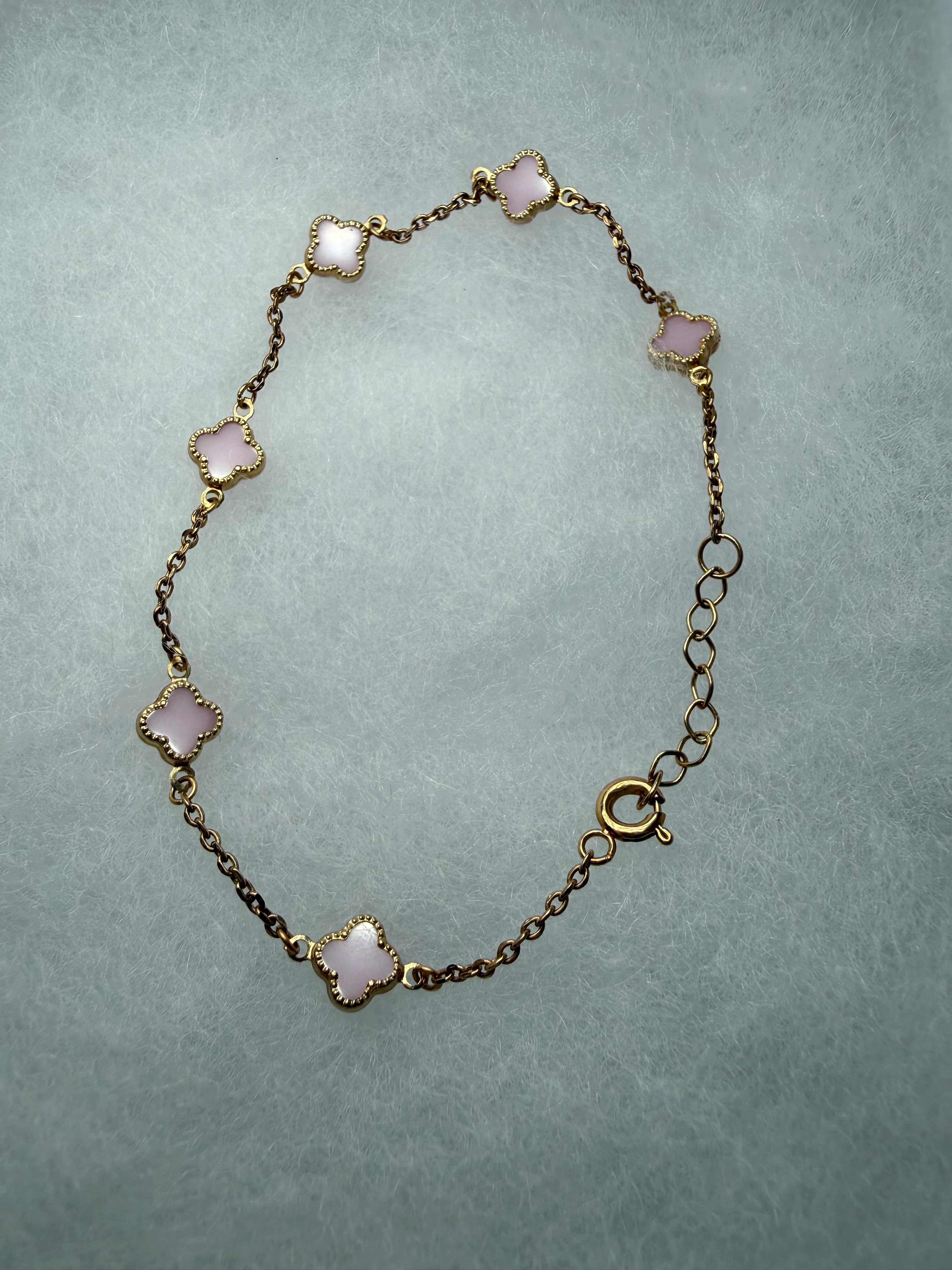 Pulsera de mujer con diseño de 6 flores en color rozado