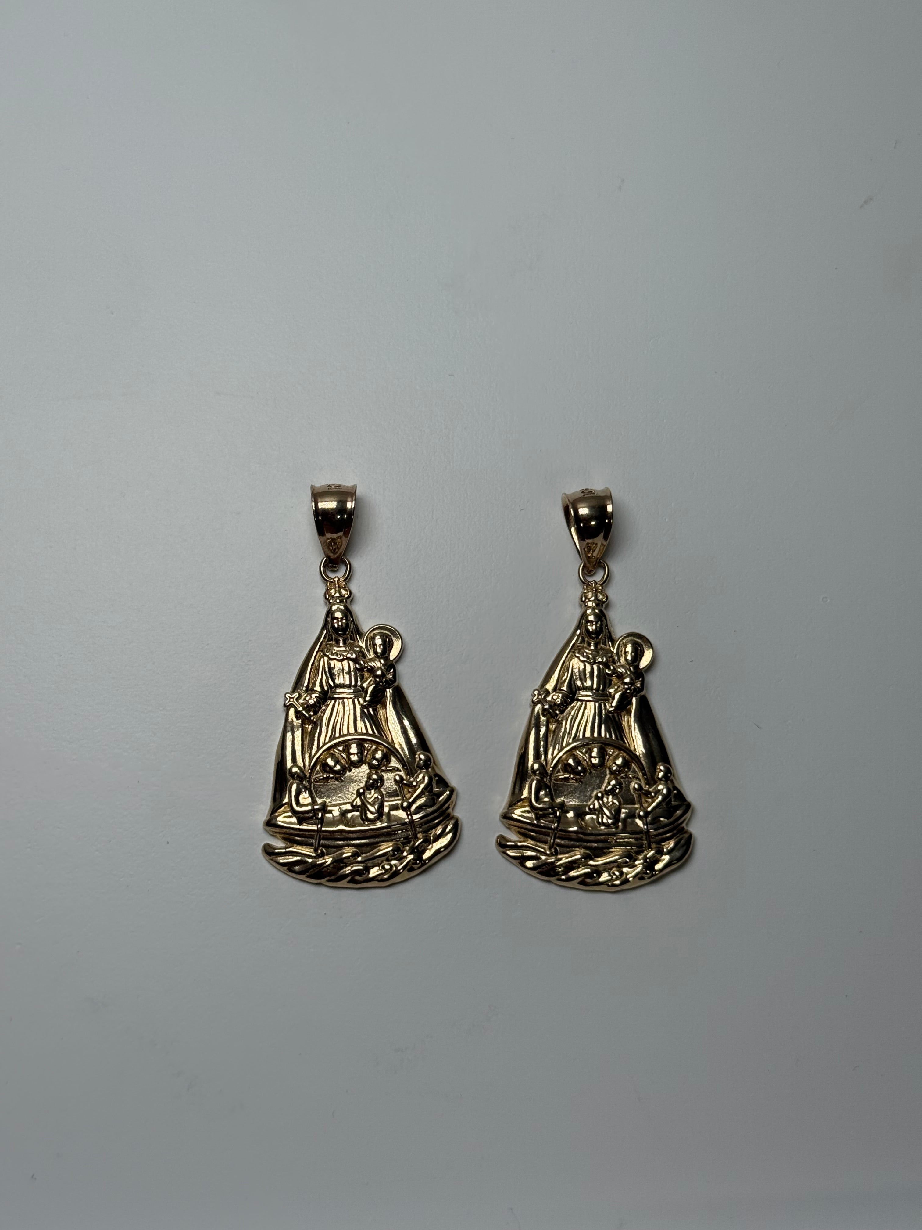 Dijes de La caridad del cobre